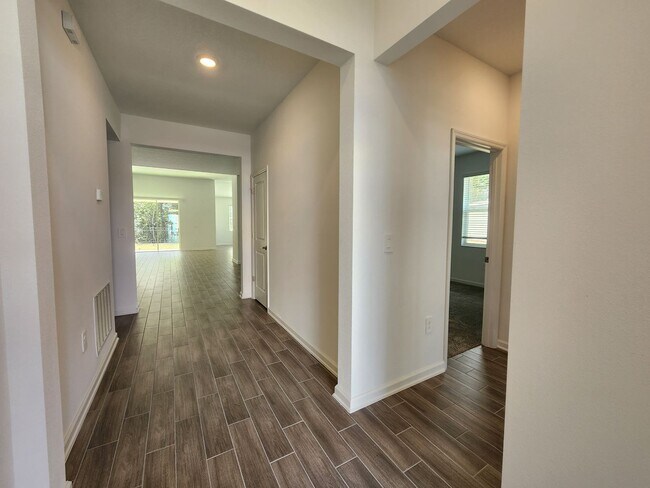 Building Photo - Beautiful Like New One Story Pine Glen Home with Solar Panels for Energy Efficiency & Three Car G...