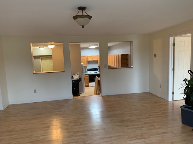 Spacious living room steps down into kitchen/dining. - 34 E Highway 61