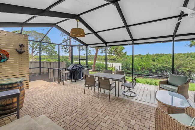 Foto del edificio - FURNISHED WATERFRONT WITH BOAT DOCK CAYA COSTA HOME 3/2/1