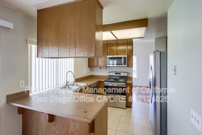 Building Photo - 9050 Mesa Woods Ave