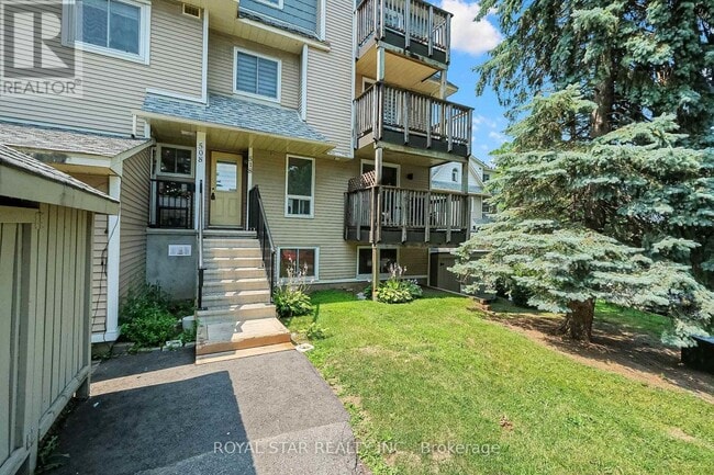 Photo du bâtiment - 518-518 Tanguay Ct