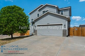 Building Photo - 6447 Passing Sky Dr