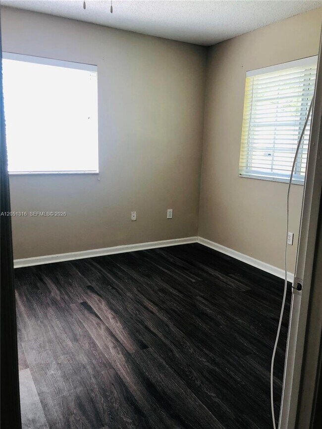 Building Photo - 3211 Sabal Palm Manor
