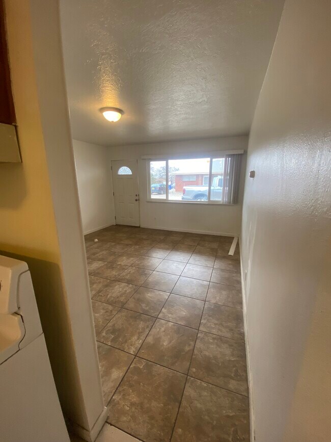 View into living room from kitchen door - 4505 Douglas MacArthur RD NE
