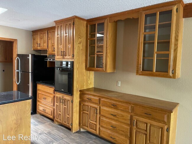 Building Photo - 2 br, 2 bath House - 1128 REDBUD  AVE.
