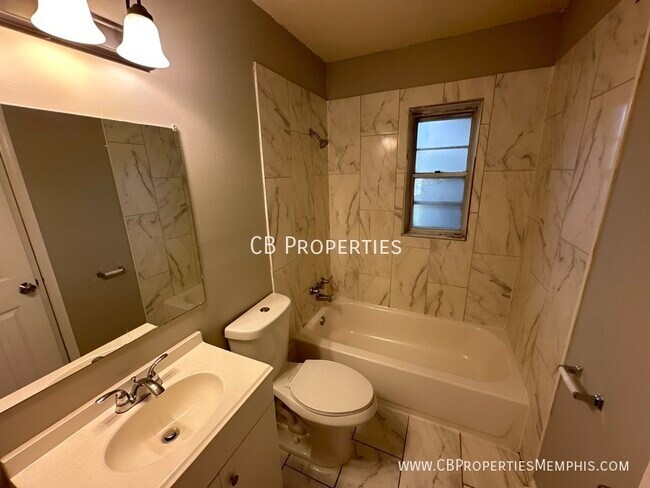 Building Photo - 1666 Raymore Road Memphis, TN 38117