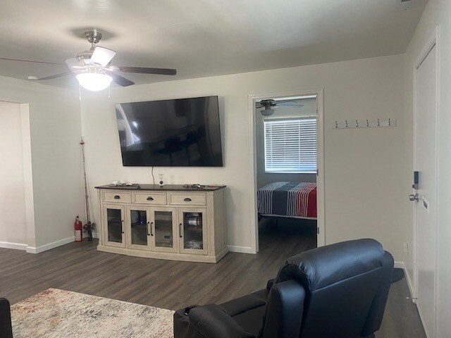 living room looking into first bedroom - 6044 E Highway 20