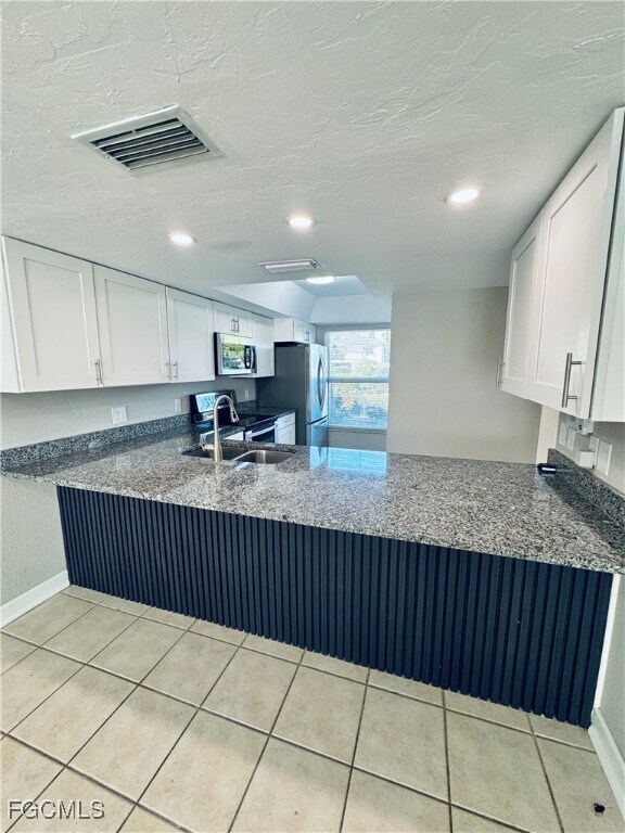 Foto del edificio - 4641 SW Santa Barbara Pl