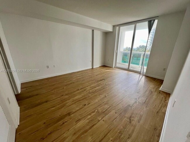 Building Photo - 10275 Collins Ave