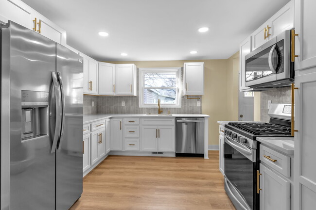 Kitchen w/ Stainless Steel Appliances - 44 Birkdale Rd