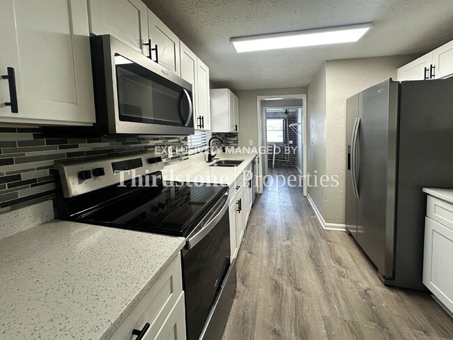 Building Photo - 10833 Liscard Rd S