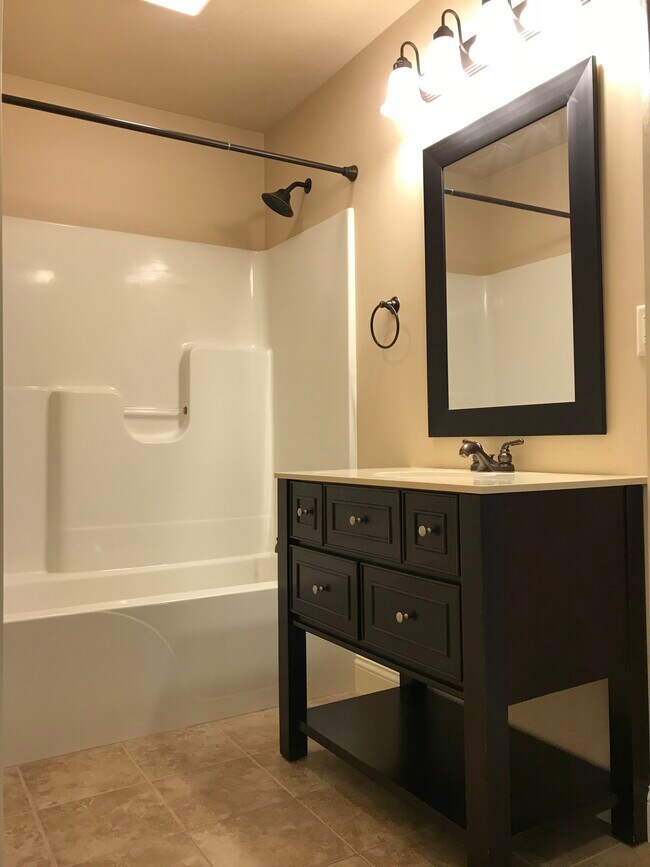 Full, master bathroom with walk-in closet. - 104 Scenic Drive