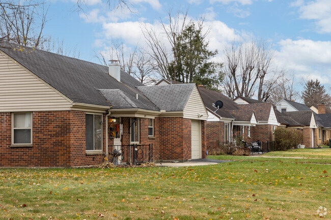 Well-built Cape Cod-style homes line a street in Trotwood.