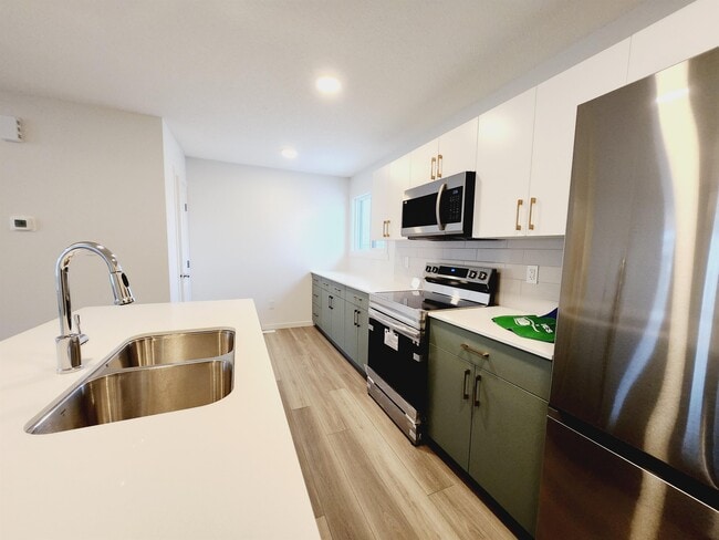 Photo du bâtiment - 1182 Aster Blvd