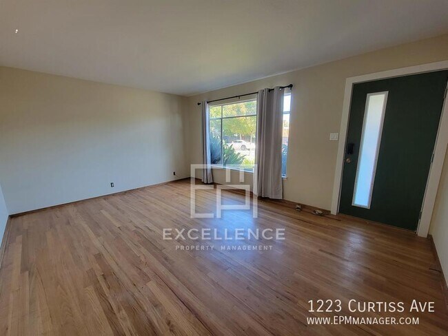 Building Photo - 1223 Curtiss Ave