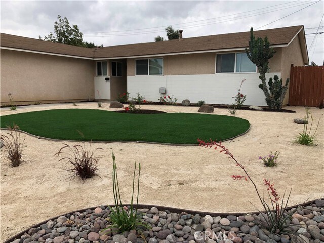 Building Photo - 8975 Delano Dr