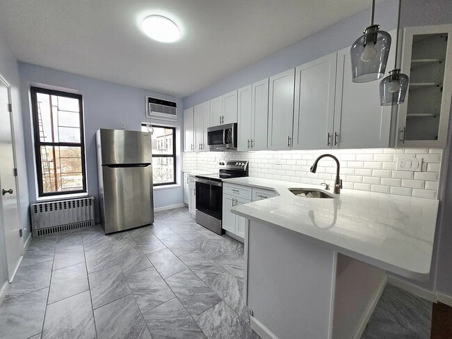 Building Photo - sunny, renovated, rent-stabilized one-bedroom apartment