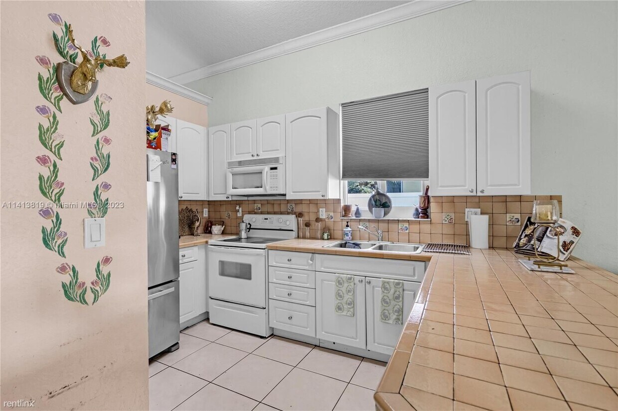 Building Photo - 3 br, 2 bath House - 5140 SW 134th Ave