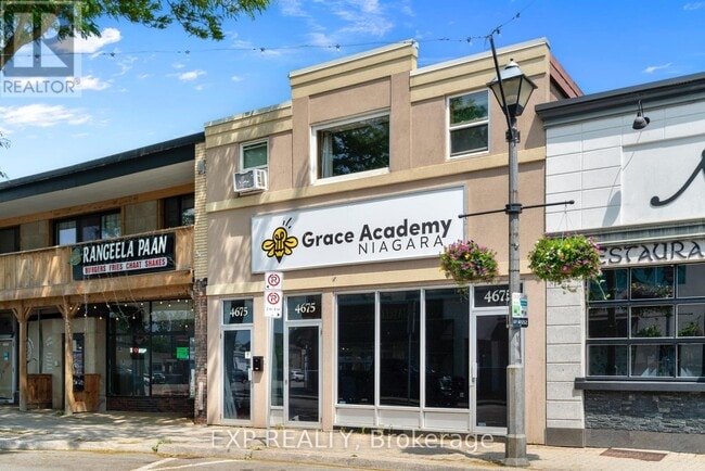 Building Photo - 4675-4675 Queen St