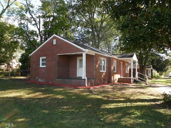 Building Photo - 4134 N Dearing St NE