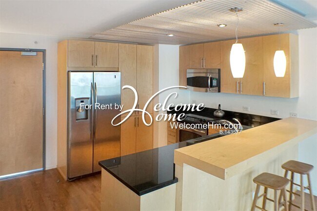Foto del edificio - High-rise Montage - Extra Large 1 Bedroom ...