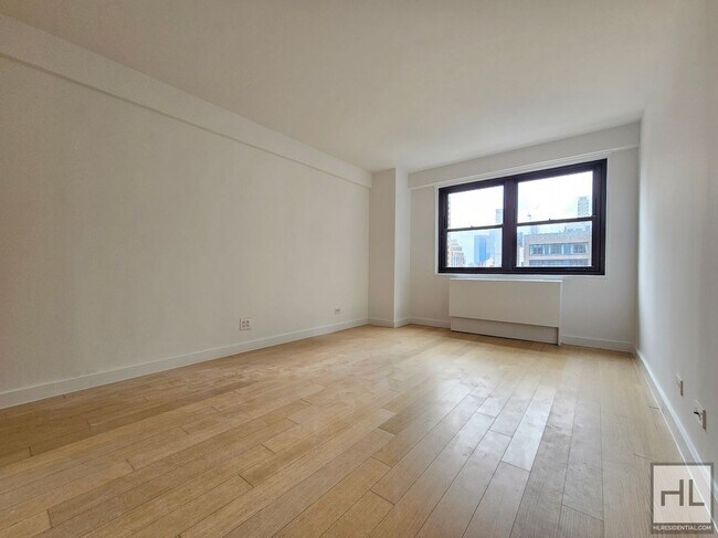 Building Photo - Luxury 1-Bedroom with 1.5 Baths | 22nd Flo...