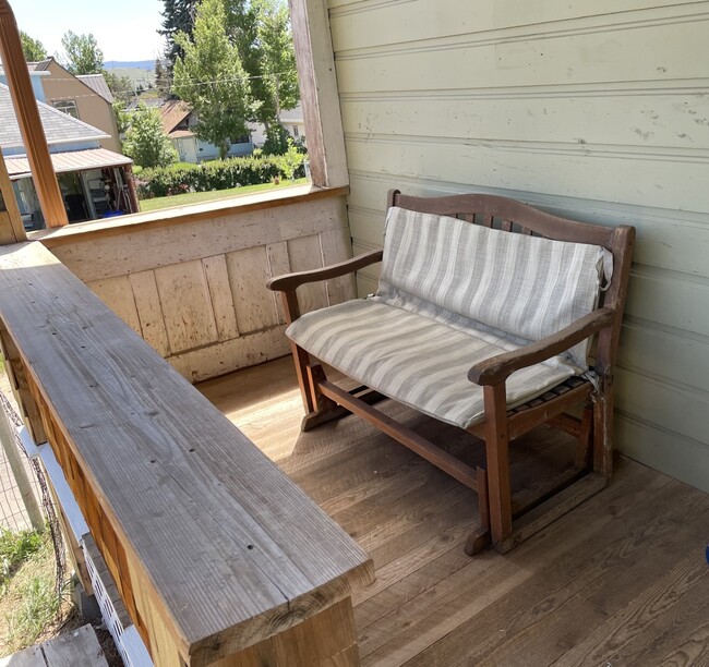 Front porch glider - 215-1/2 N Emmett