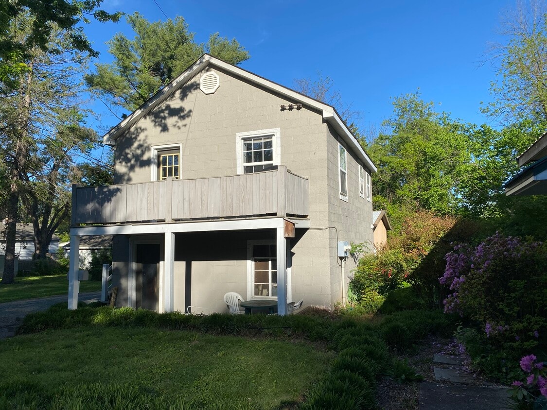 Exterior view set back from street. - 208 Meade Ave