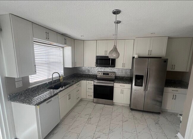Foto del edificio - 5526 Clover Rise Ln