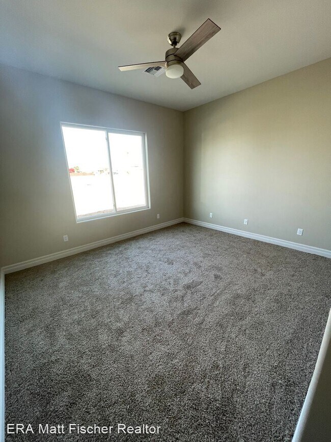 Building Photo - 4 br, 3.5 bath House - 14827 E 47TH DRIVE