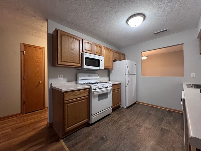 Building Photo - End Unit Two Bed Two Bath Second Floor Con...