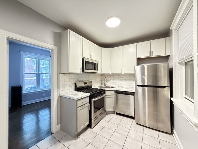 Foto del edificio - 6259 N Lakewood Ave