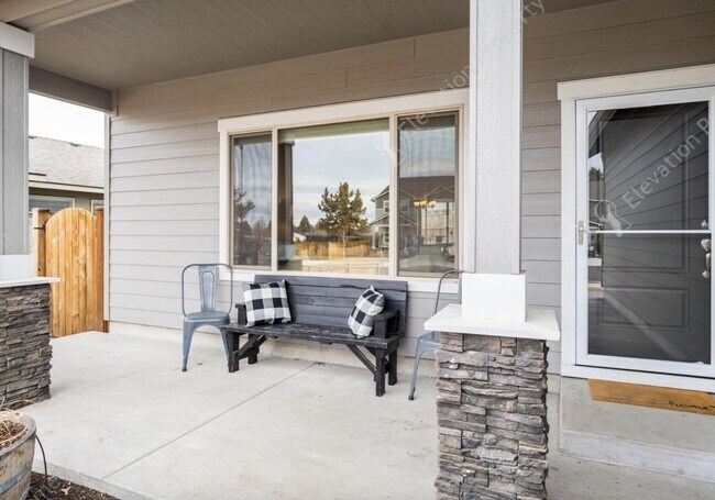 Building Photo - Spacious 4-Bedroom Home with Main Floor Pr...
