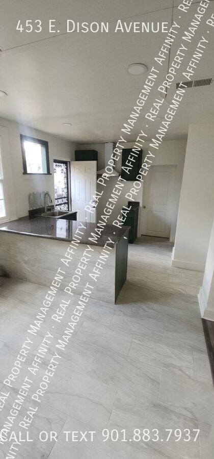 Building Photo - 453 E Dison Ave