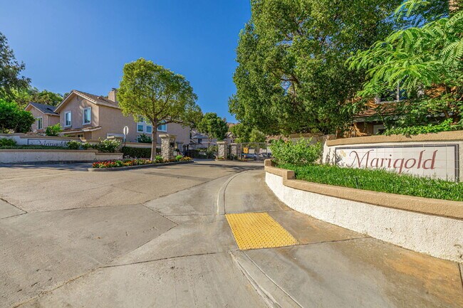 Building Photo - 3 Bedroom Home in The Gated Marigold Tract...