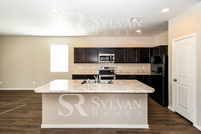 Building Photo - This charming home is ready for your perso...