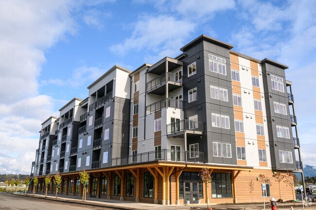 Building Photo - Modern Studio, One, and Two-Bedroom Apartm...