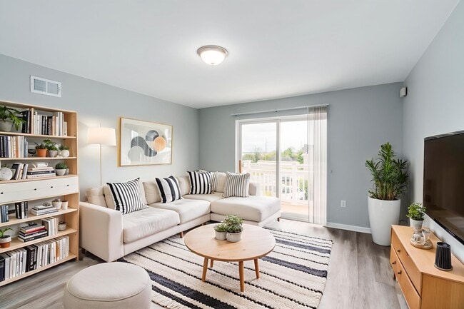 Living Room with Furniture - View 1 - Waterglen Apartments