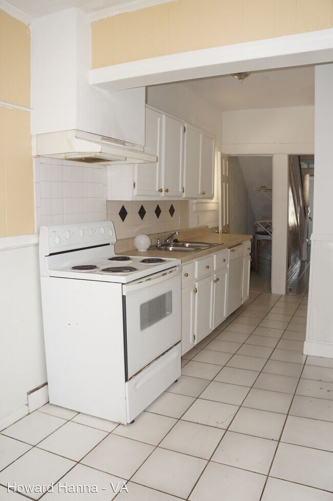 Building Photo - 4 br, 2 bath House - 1545 West 42nd Street