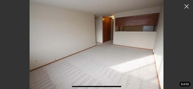 Living room/dining room - 5625 W Brown Deer Rd