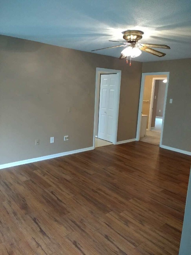 Living Room toward bathroom & 2nd Bedroom - 1018 Brinker Dr