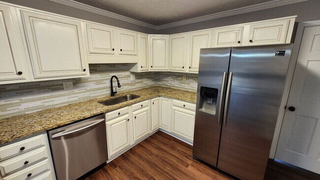 Building Photo - Spacious 5-Bedroom Home with Amenities in Woodstock!