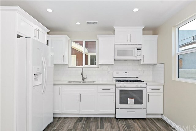 Building Photo - 1327 W 37th Pl
