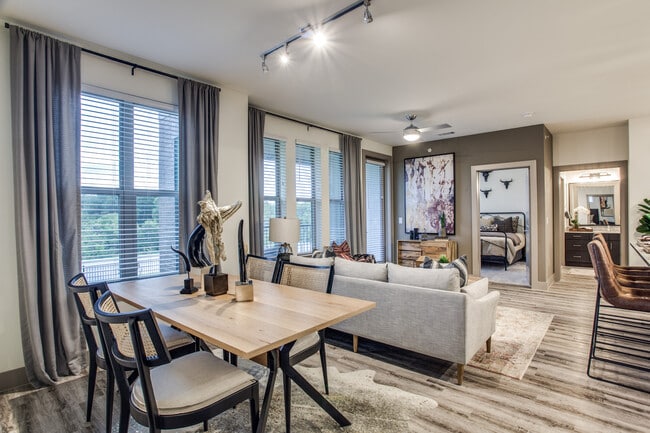 Living and dining area with hard surface flooring - Avalon Benbrook