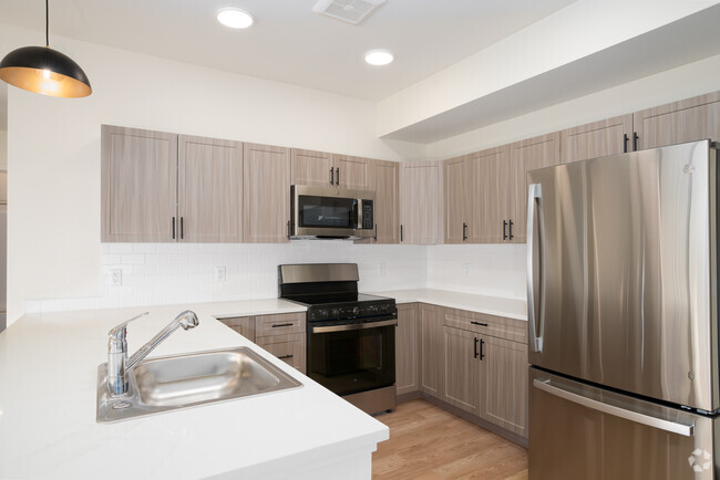 3BR, 2BA - 1170SF - Kitchen - Pine at Wildroot