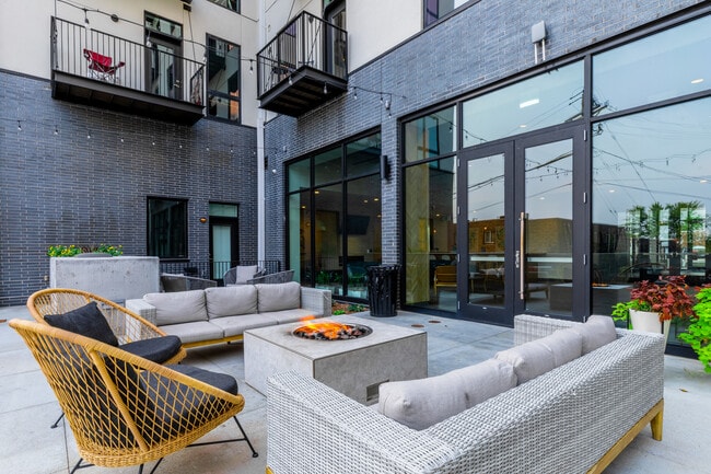 Outdoor Lounge with Firepit - Corner Apartments
