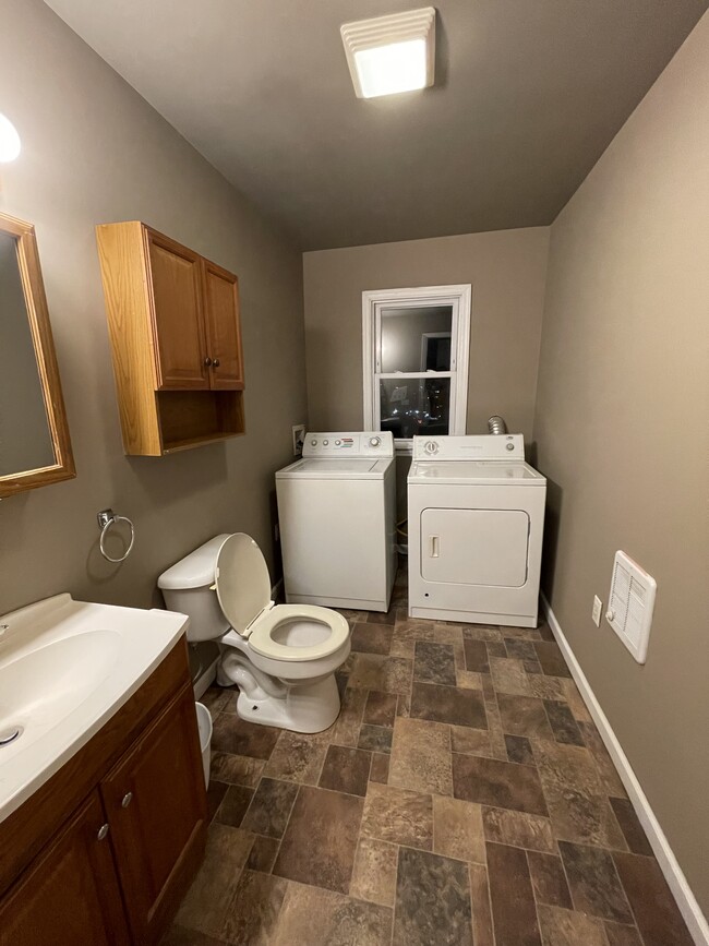 1/2 bath with laundry - 1007 Clay Ave