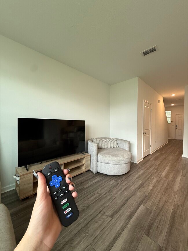 Roku TV in living room - 6206 Daerr Ridge St