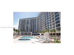 Building Photo - 10275 Collins Ave