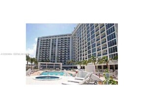 Building Photo - 10275 Collins Ave